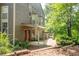 View of the exterior with a covered front porch and well-maintained landscaping at 607 Riverview Se Dr # 607, Marietta, GA 30067