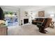 Spacious living room with fireplace, sliding glass door and comfortable seating at 607 Riverview Se Dr # 607, Marietta, GA 30067