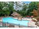 Community pool featuring ample seating and pergolas at 607 Riverview Se Dr # 607, Marietta, GA 30067