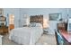 Cozy bedroom featuring a decorative headboard, soft lighting, and a serene atmosphere at 663 Serramonte Dr, Marietta, GA 30068