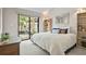 Comfortable bedroom with a sliding glass door and neutral decor at 663 Serramonte Dr, Marietta, GA 30068