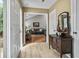 Charming foyer with hardwood floors, traditional furniture, and a glimpse into the cozy living room at 663 Serramonte Dr, Marietta, GA 30068