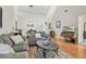 Bright living room featuring vaulted ceilings, hardwood floors, and comfortable seating at 663 Serramonte Dr, Marietta, GA 30068