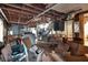 Unfinished basement shows exposed rafters and utilities surrounded by boxes and miscellany at 1774 Willis Mill Rd, Atlanta, GA 30311
