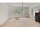 Well-lit bedroom with three windows, an open doorway and light-colored carpet at 1774 Willis Mill Rd, Atlanta, GA 30311