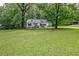 Charming one-story home surrounded by lush greenery, offering a peaceful retreat at 1774 Willis Mill Rd, Atlanta, GA 30311