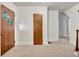 Bright hallway with hardwood doors and trim, offering a warm and inviting atmosphere at 1774 Willis Mill Rd, Atlanta, GA 30311