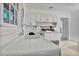 Functional kitchen features white cabinets, a window over the sink and ample counter space at 1774 Willis Mill Rd, Atlanta, GA 30311