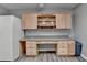 The kitchen features custom wood cabinetry and a gray countertop at 2612 Back Creek Chase, Dacula, GA 30019