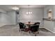 Open living room with carpet, dining space, and kitchen pass-through at 2612 Back Creek Chase, Dacula, GA 30019