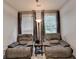 Comfortable living room featuring two chairs, with natural lighting at 2612 Back Creek Chase, Dacula, GA 30019