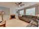 Inviting living room with a cozy fireplace and ample natural light at 2612 Back Creek Chase, Dacula, GA 30019