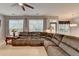 Bright living room with a large sectional couch and natural light at 2612 Back Creek Chase, Dacula, GA 30019