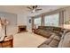 Comfortable living room featuring a brick fireplace and neutral decor at 2612 Back Creek Chase, Dacula, GA 30019