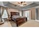 This main bedroom has neutral walls and a door leading to the bathroom at 2612 Back Creek Chase, Dacula, GA 30019