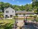 Large backyard with a lawn, patio, landscaping, and a playset at 237 Lamplighter Ln, Marietta, GA 30067