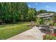 Backyard with patio, lush lawn, grilling area, and a dining set, perfect for entertaining at 237 Lamplighter Ln, Marietta, GA 30067