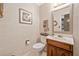 Elegant half bath features decorative wallpaper, marble countertops, and modern fixtures at 237 Lamplighter Ln, Marietta, GA 30067