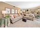 Spacious living room with neutral decor, plush seating, and ample natural light from large windows at 237 Lamplighter Ln, Marietta, GA 30067
