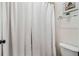 Bathroom with a white shower curtain and a view of the toilet at 4588 Pine Se St, Smyrna, GA 30080