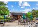 Inviting Starbucks with outdoor seating, surrounded by lush greenery and a vibrant atmosphere at 4588 Pine Se St, Smyrna, GA 30080