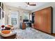 Stylish home office featuring a Murphy bed, built-in shelving, and a bright window at 4588 Pine Se St, Smyrna, GA 30080