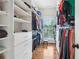 Well-organized walk-in closet featuring custom shelving and ample storage space at 4588 Pine Se St, Smyrna, GA 30080