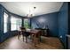 Inviting dining room with natural light and modern chandelier at 74 Knights Ct, Dallas, GA 30157