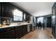 Well-lit kitchen with stainless steel appliances and modern cabinetry at 74 Knights Ct, Dallas, GA 30157