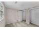 Neutral bedroom with carpet flooring and natural light from the window at 2596 Midway Rd, Decatur, GA 30030