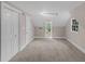 Attic bedroom with carpet, built-in storage, and natural light at 2596 Midway Rd, Decatur, GA 30030