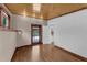 Cozy room with wood ceiling and an outdoor view through the glass panel door at 2596 Midway Rd, Decatur, GA 30030