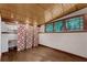 Bright bonus room with wood ceiling, unique windows and ample storage space at 2596 Midway Rd, Decatur, GA 30030