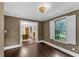 Elegant dining room with hardwood floors and a view to the outdoor scenery at 2596 Midway Rd, Decatur, GA 30030