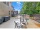 Backyard patio featuring a deck, grilling area, fire pit and outdoor seating at 267 Snow Owl Way, Lawrenceville, GA 30044
