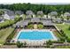 The community's inviting pool area features ample seating and well-maintained landscaping for residents' relaxation and enjoyment at 3525 Montebello Pkwy, Cumming, GA 30028