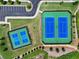 Aerial view showcasing the community's well-maintained tennis courts, perfect for active residents and sports enthusiasts at 3525 Montebello Pkwy, Cumming, GA 30028