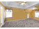 Spacious bedroom featuring carpet flooring and neutral walls at 3780 Summit Gate Dr, Suwanee, GA 30024
