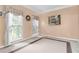 Bright bedroom featuring two windows, neutral paint, and plush carpet at 3780 Summit Gate Dr, Suwanee, GA 30024