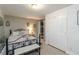 This bedroom showcases a cozy bed and a spacious closet at 3780 Summit Gate Dr, Suwanee, GA 30024