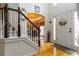 Bright foyer with hardwood floors, a staircase, and a front door with sidelights at 3780 Summit Gate Dr, Suwanee, GA 30024