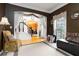 Cozy living room with natural light and view to foyer and staircase at 3780 Summit Gate Dr, Suwanee, GA 30024