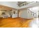Bright open floor plan featuring hardwood floors, with kitchen and staircase at 3780 Summit Gate Dr, Suwanee, GA 30024
