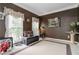 Cozy living room with natural light, neutral carpet, and decorative window treatments at 3780 Summit Gate Dr, Suwanee, GA 30024
