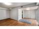 Spacious basement featuring sleek hardwood flooring and sliding glass doors at 3946 Flakes Mill Rd, Decatur, GA 30034