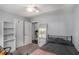 Bedroom featuring built-in shelves and a view into another room at 3946 Flakes Mill Rd, Decatur, GA 30034