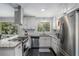 Stylish kitchen featuring granite countertops, stainless steel appliances, and ample cabinet space at 3946 Flakes Mill Rd, Decatur, GA 30034