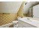 This unique bath features a pedestal sink, toilet, and tiled floor at 5545 Durrett Dr, Atlanta, GA 30338