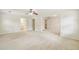 Spacious bedroom featuring neutral carpet and access to a bathroom at 5545 Durrett Dr, Atlanta, GA 30338