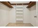 Walk-in closet with shelving and storage space at 5545 Durrett Dr, Atlanta, GA 30338
